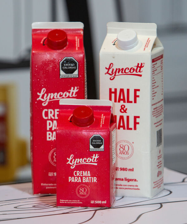 Imagen del rebranding de Lyncott en tonos rojo y crema